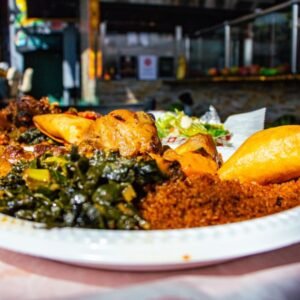 Chicken Yassa stew platter with rice